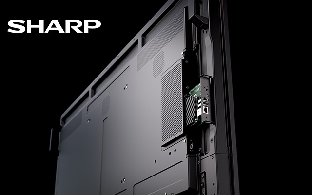 the rear of a screen with peripheral device inserted in the side